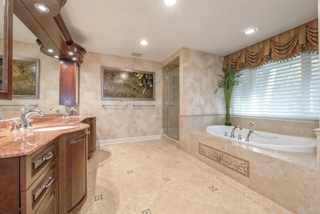 bathroom with vanity and plus walk in shower