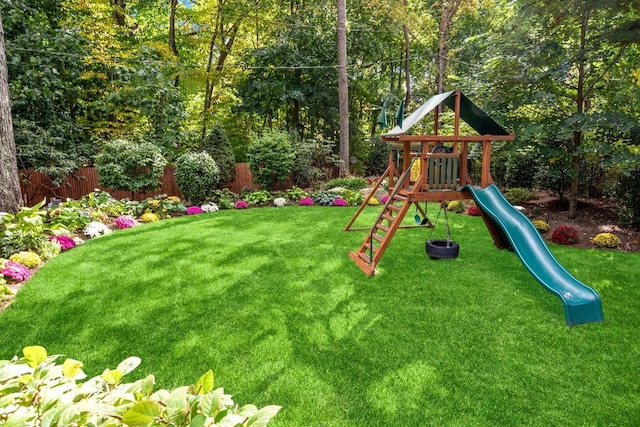 view of playground featuring a yard