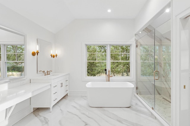 bathroom featuring vanity, vaulted ceiling, and plus walk in shower