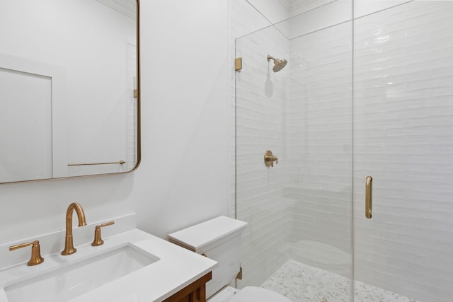 bathroom featuring walk in shower, vanity, and toilet