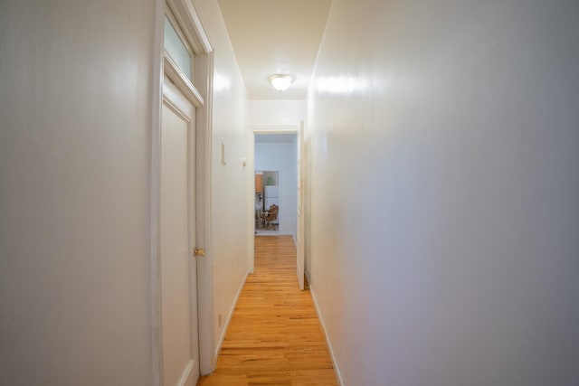 hallway featuring light wood-type flooring