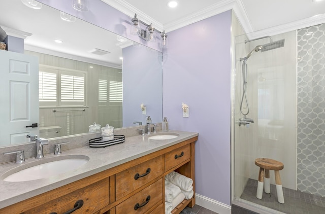 bathroom with crown molding, tiled shower, vanity, and toilet