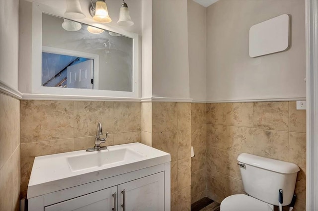24 Wagner St, Call Listing Agent, NY 13339 - bathroom with tile walls, toilet, and vanity