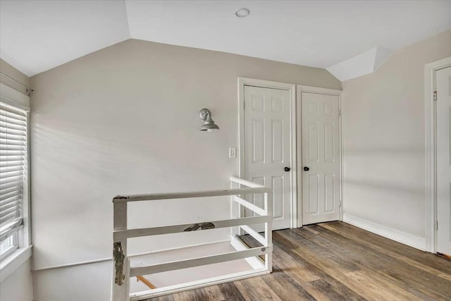24 Wagner St, Call Listing Agent, NY 13339 - unfurnished bedroom with lofted ceiling, wood finished floors, and baseboards