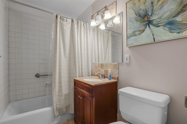 full bathroom with vanity, toilet, and shower / tub combo