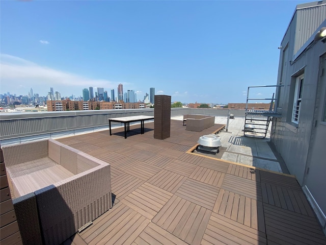 view of patio featuring a balcony