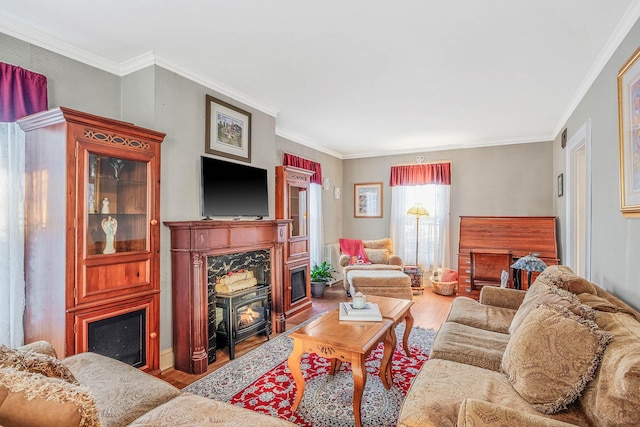 living room featuring hardwood / wood-style floors and crown molding