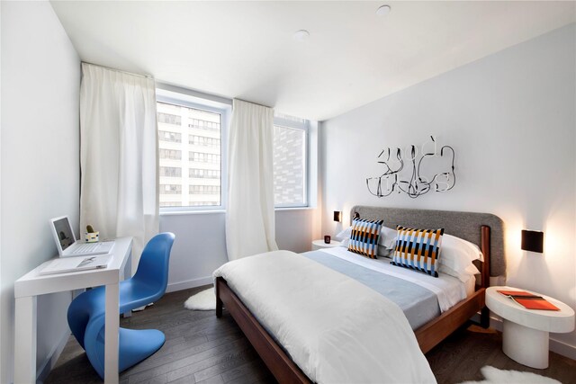 bedroom featuring dark hardwood / wood-style floors