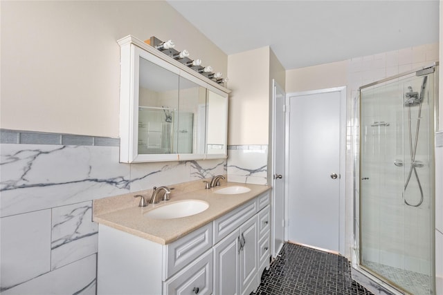 bathroom with tile walls, tile patterned floors, and walk in shower