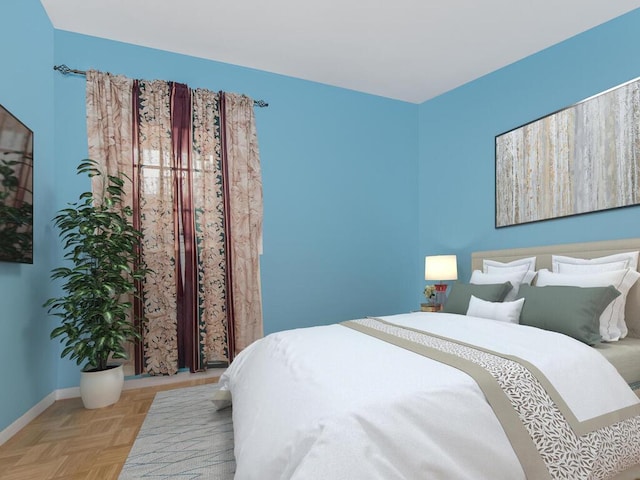 bedroom with light parquet flooring