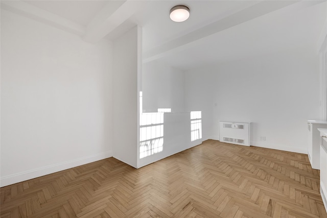 spare room featuring light parquet flooring