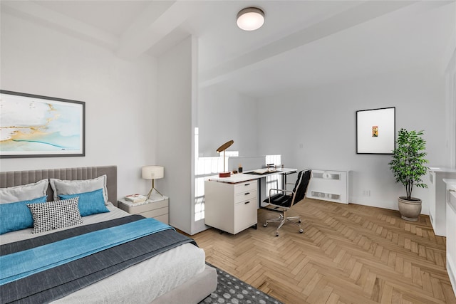 bedroom with light parquet flooring