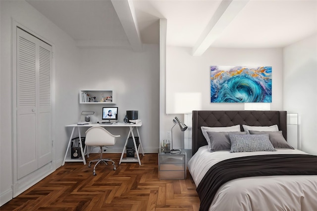 bedroom with a closet, dark parquet floors, and beamed ceiling