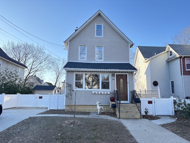 45 Lynbrook Ave, Lynbrook, NY 11563 - view of front of property featuring a gate and board and batten siding