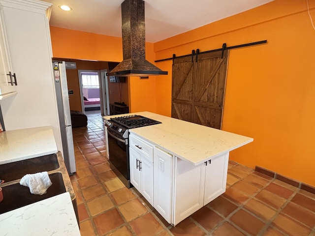 45 Lynbrook Ave, Lynbrook, NY 11563 - kitchen featuring exhaust hood, gas stove, freestanding refrigerator, white cabinets, and recessed lighting