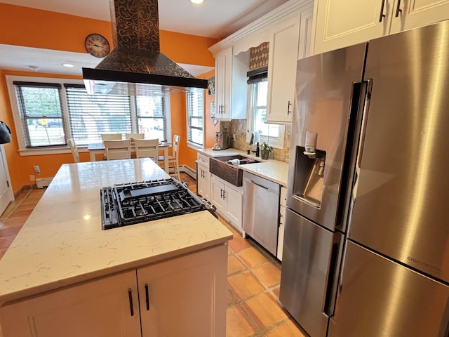 45 Lynbrook Ave, Lynbrook, NY 11563 - kitchen featuring appliances with stainless steel finishes, custom range hood, white cabinetry, a center island, and recessed lighting