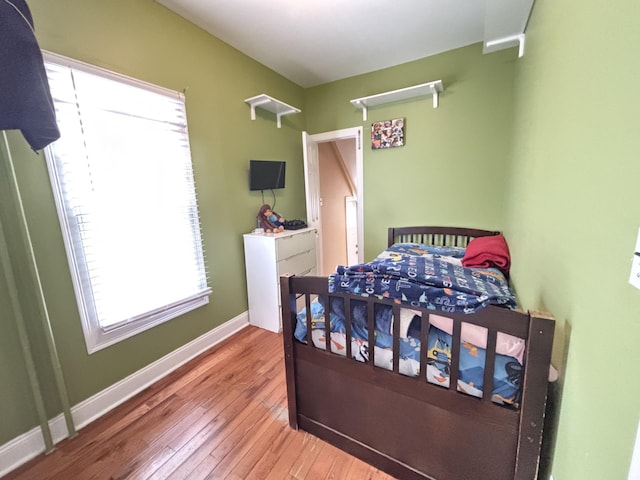 45 Lynbrook Ave, Lynbrook, NY 11563 - bedroom featuring hardwood / wood-style floors and multiple windows