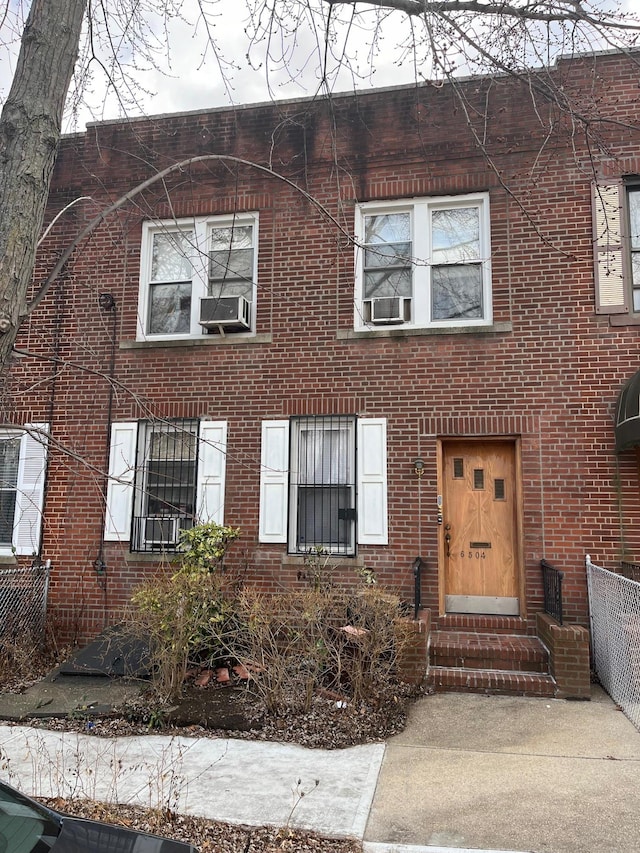 view of front of home featuring cooling unit