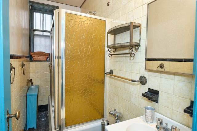 bathroom with tile walls and sink