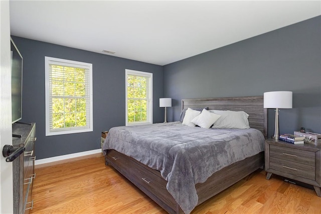 bedroom featuring light hardwood / wood-style flooring