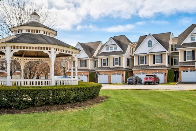 exterior space with a gazebo and a yard