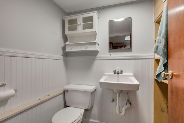 bathroom with toilet and sink