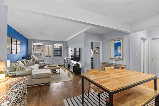 dining area with dark hardwood / wood-style floors