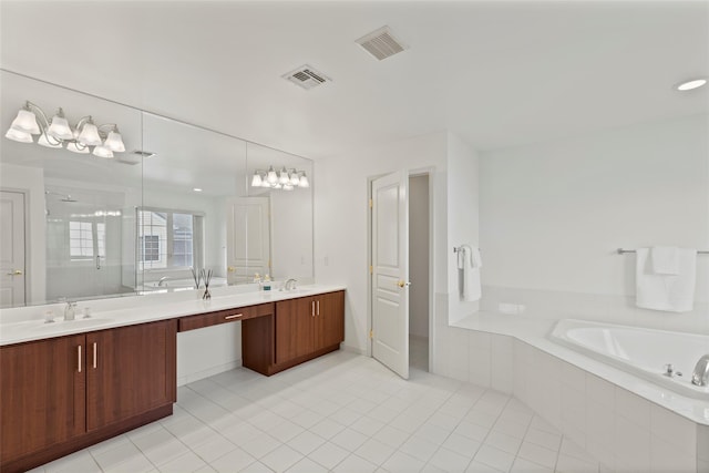 bathroom with vanity, tile patterned floors, and plus walk in shower