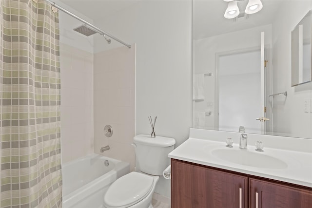 full bathroom featuring vanity, shower / bath combo with shower curtain, and toilet