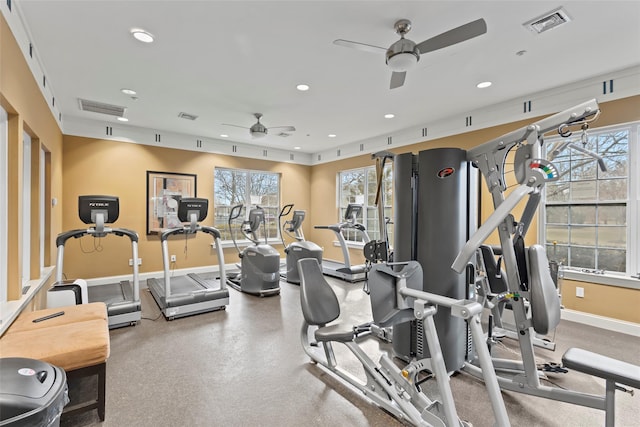 workout area with ceiling fan and a healthy amount of sunlight