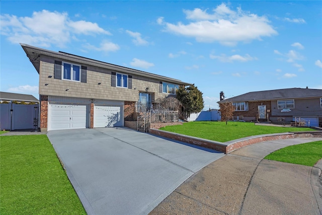 view of front of house with a garage and a front yard