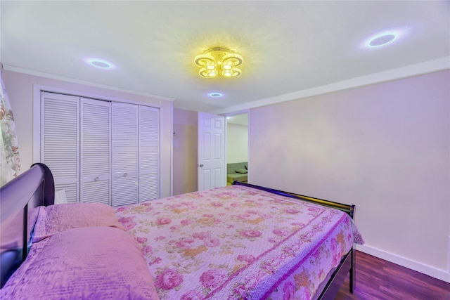 bedroom featuring a closet and dark wood-type flooring