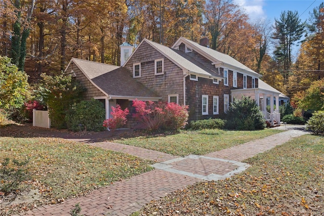 view of home's exterior featuring a lawn