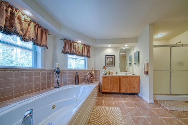 bathroom featuring tile patterned floors, vanity, and independent shower and bath