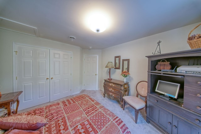 living area featuring light carpet