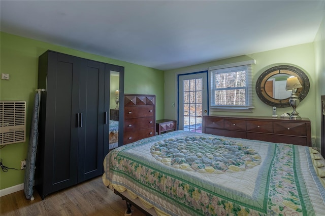 bedroom featuring wood-type flooring