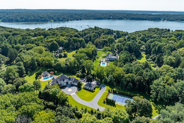 birds eye view of property with a water view