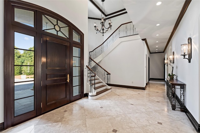 foyer entrance featuring ornamental molding