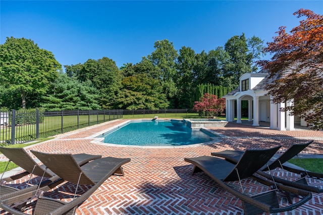 view of swimming pool featuring a patio area