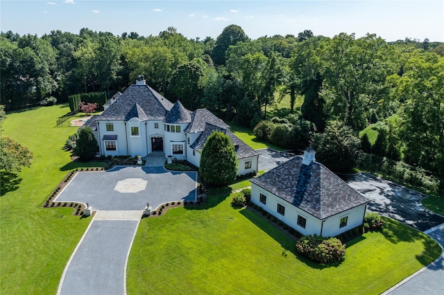 aerial view with a wooded view