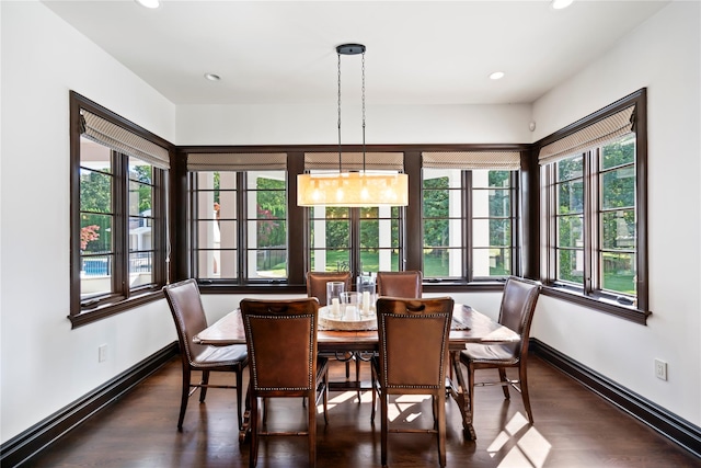 dining area featuring recessed lighting, baseboards, a baseboard heating unit, and dark wood-style floors