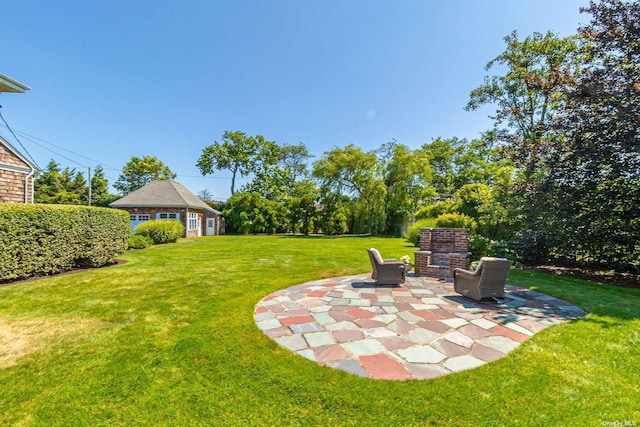 view of yard featuring a patio area and an outdoor structure