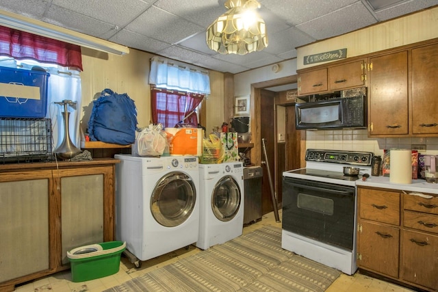 washroom featuring independent washer and dryer