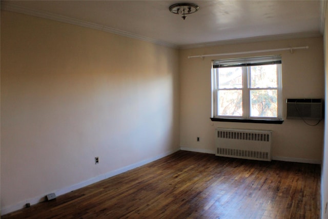 spare room featuring radiator heating unit, dark hardwood / wood-style floors, an AC wall unit, and crown molding