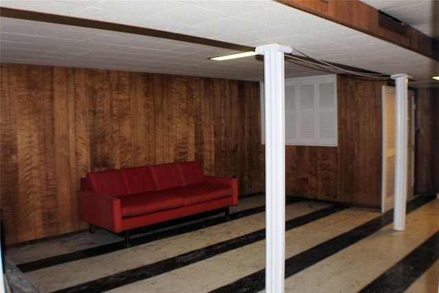 basement with wooden walls