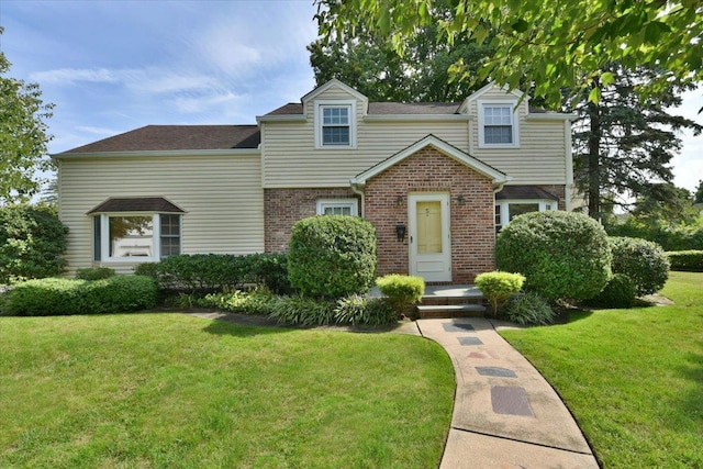 view of front of property with a front lawn