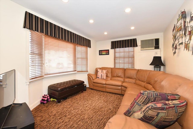 living room featuring a wall unit AC