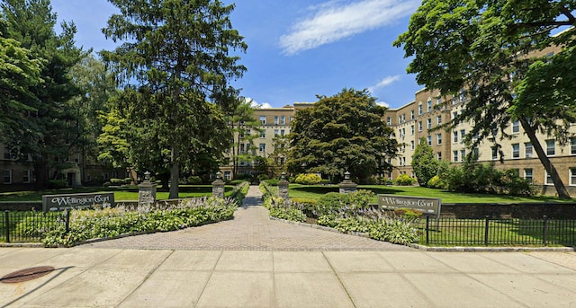 surrounding community featuring a lawn