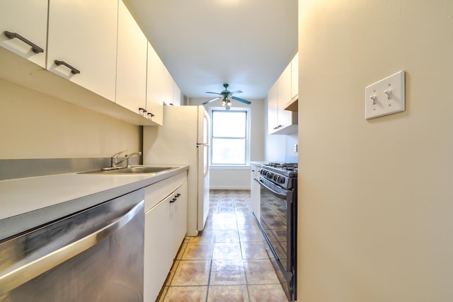 kitchen featuring dishwasher, black gas range oven, white cabinets, and sink