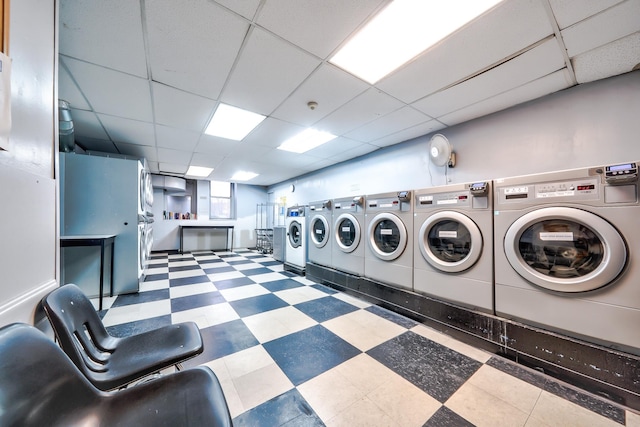 washroom with independent washer and dryer